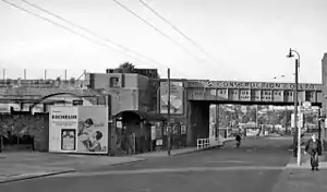 The Brentford station site in 1961, as viewed eastwards from the A315 London Road. The station closed in May 1942, and the platform buildings were demolished in 1957. The bridge over the road was removed in 1965 when the line south of Brentford Town Goods was dismantled.