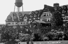 Porch and porte-cochère of a Tudor Revival hotel