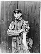 Newly liberated Buchenwald survivor shows his ID tattoo.