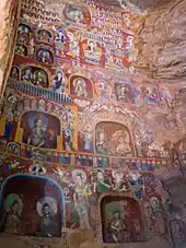 Northern Wei murals and painted figurines from the Yungang Grottoes, dated 5th to 6th centuries.