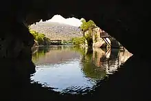 Image 26The cave of source of the Buna can be entered by boat and dived through a cave system serving as an effluence of the Zalomka. (from Subterranean river)