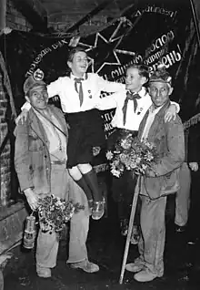 Miners and pioneers pose in front of the Banner of Krivoi Rog. 1952.