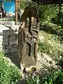 Unusual pillar style khachkar with a Maltese Cross located down the road from the church.