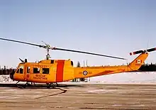 Base Flight Cold Lake CH-118 Iroquois helicopter 118103 at CFB Cold Lake, January 1992.