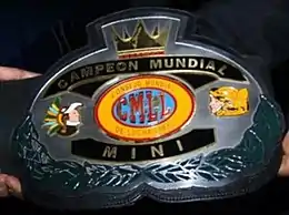 A championship belt reading ""Campeon Mundial Mini