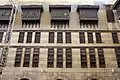 The facade of the upper floors around the courtyard