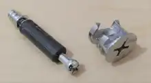 Cam lock screw (right) with special steel dowel pin or screw (left)