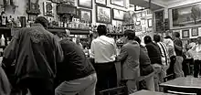 Locals at the bar of the El Nivel cantina