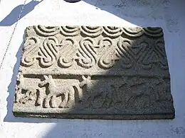 Old reused stone slab, now in exposition in Formigueiros, Amoeiro, Galicia