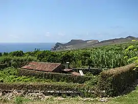 The western landscape of Capelo, showing the Capelinhos Volcano, as it appeared (c.1990)