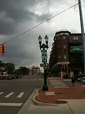 A reassurance marker at the corner of Michigan Avenue and Cedar Street