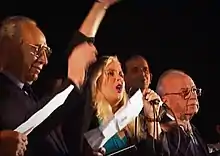 Minister of Foreign Affairs Shimon Peres (far left) and Prime Minister Rabin (far right) during the rally