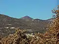 Panoramic view of the Saint Mary Magdelene Church (The conical hill is in Champtercier.)