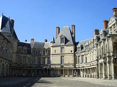 The Oval Courtyard, with the Medieval donjon, a vestige of the original castle where the King's apartments were located, in the center.