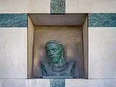 Bronze bust of Jesus with in the Monumental cemetery of Brescia.