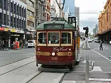 A W7-class tram on Flinders Street