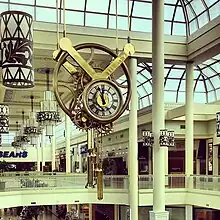 Brass clocks at Oakville Place