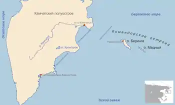 The triangular Kamchatka Peninsula is to the left, and on the right half are the small Bering Island, which is rectangular and slanted left, and Copper Island, which is also rectangular and slanted left but smaller than Bering Island.