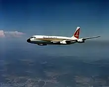 Left side view of an aircraft in flight