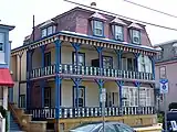 J. F. Fryer cottage, Cape May, New Jersey (1878–79). The pierced-tile inserts in the railings are believed to have come from the Japanese Pavilion at the 1876 Centennial Exposition.