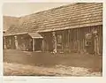 Cowichan housefront with carved house posts