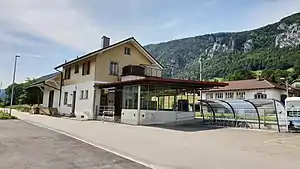 Two-story building with gabled roof