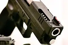 Springfield Armory, Inc., custom XD-40 V-10 with ported barrel and slide intended to reduce muzzle rise