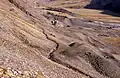 View of the mine workings with one of the many leats in the foreground