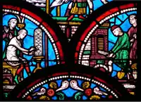 Detail from a 13th-century window in the Basilica of Saint-Quentin depicting the creation of a stained glass window in Middle Ages.