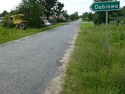 Road sign leading to Dąbrowa