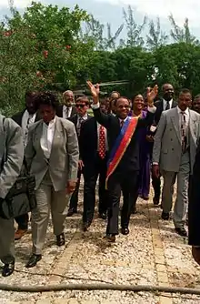 Image 17President Jean-Bertrand Aristide returns triumphantly to the National Palace at Port-au-Prince, Haiti in 1994 (from History of Haiti)