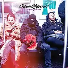 three people sitting in the subway