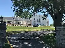 old white church with newer section attached