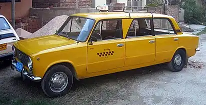 A Lada stretched as a limousine taxi in Trinidad, Cuba, 2006