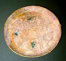 Image 1This earthenware dish was made in 9th-century Iraq. It is housed in the Smithsonian Institution in Washington, D.C. (from History of Iraq)