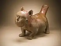 Dog with Human Mask, Mexico, Colima, slip-painted ceramic sculpture, 200 BC–AD 500