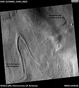 Glaciers, as seen by HiRISE, under HiWish program.  Glacier on left is thin because it has lost much of its ice.  Glacier on the right, on the other hand, is thick; it still contains a lot of ice that is under a thin layer of dirt and rock.