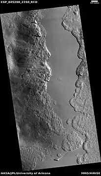 Wide view of part of Milankovič crater, as seen by HiRISE under HiWish program Many depressions here contain ice in their walls.