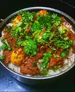 Egg Biryani garnished with cilantro