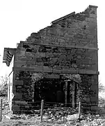 The Eglinton doocot prior to restoration. The local council had used it as a vehicle store.