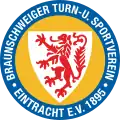 Historical version of the round logo, in use during the 1960s and early 70s