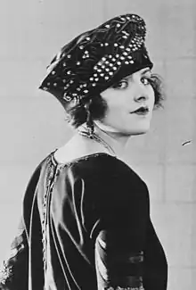 Actress Elaine Hammerstein, 1921.  The forehead was usually covered in the 1920s, here by a hat reaching to the eyebrows.