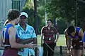 Jared Brennan and Ernie Dingo during a Brisbane Lions training session on April 11