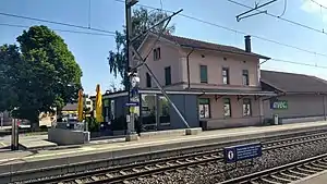 Two-story building with gabled roof