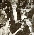 Youth is enthralled by Pleasure (Lilyan Tashman) and, while Experience looks on, is welcomed into the gay party.