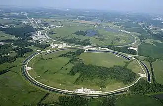 Fermilab's accelerator rings. The main injector is in the foreground, and the antiproton ring and Tevatron (inactive since 2011) are in the background.