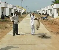 A fisherman in Wooster Nagar demonstrates his net-throwing technique.