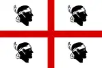 The flag of Sardinia, shows a Saint George's Cross on a white field, surrounded by four black heads, known as the Moors