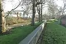 Flood defences: looking south on the east side of St James opposite Northampton Station. The river runs north to south and is a tributary of the river Nene