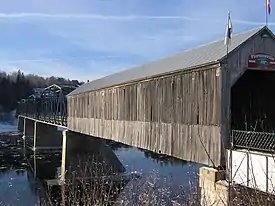 The Florenceville Bridge across the Saint John River is partly covered.